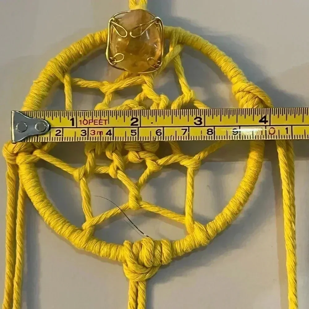 Lorena Espinoza Designs handmade yellow dream catcher with gemstone